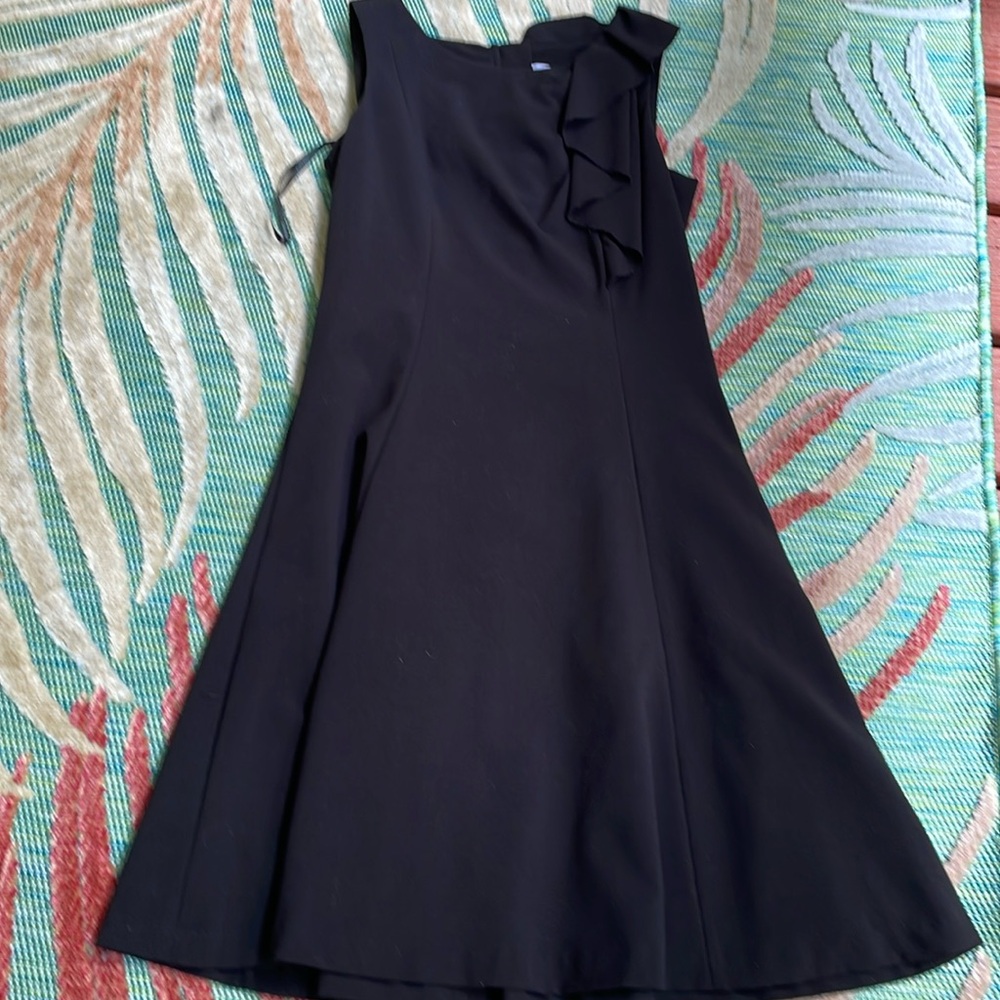 Ladies size 4 black sleeveless Calvin Klein dress used has ruffle side sleeve